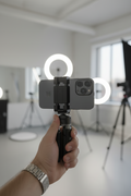 Mini grip quadripod folded as a compact phone tripod with Bluetooth remote