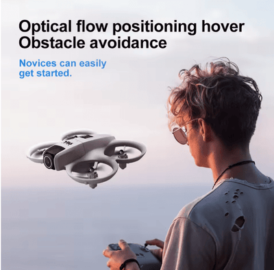 Compact dual-camera drone quadcopter in flight