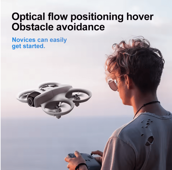 Compact dual-camera drone quadcopter in flight