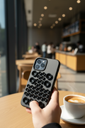 Tekvynstore silicone Pop It iPhone case with colorful, textured silicone surface and playful pop-it bubbles design.