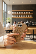 Tekvynstore Silicone Pop It iPhone case with colorful pop-it bubbles, flexible silicone material, and protective design.