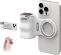 Magnetic phone grip attached to a smartphone held in landscape orientation